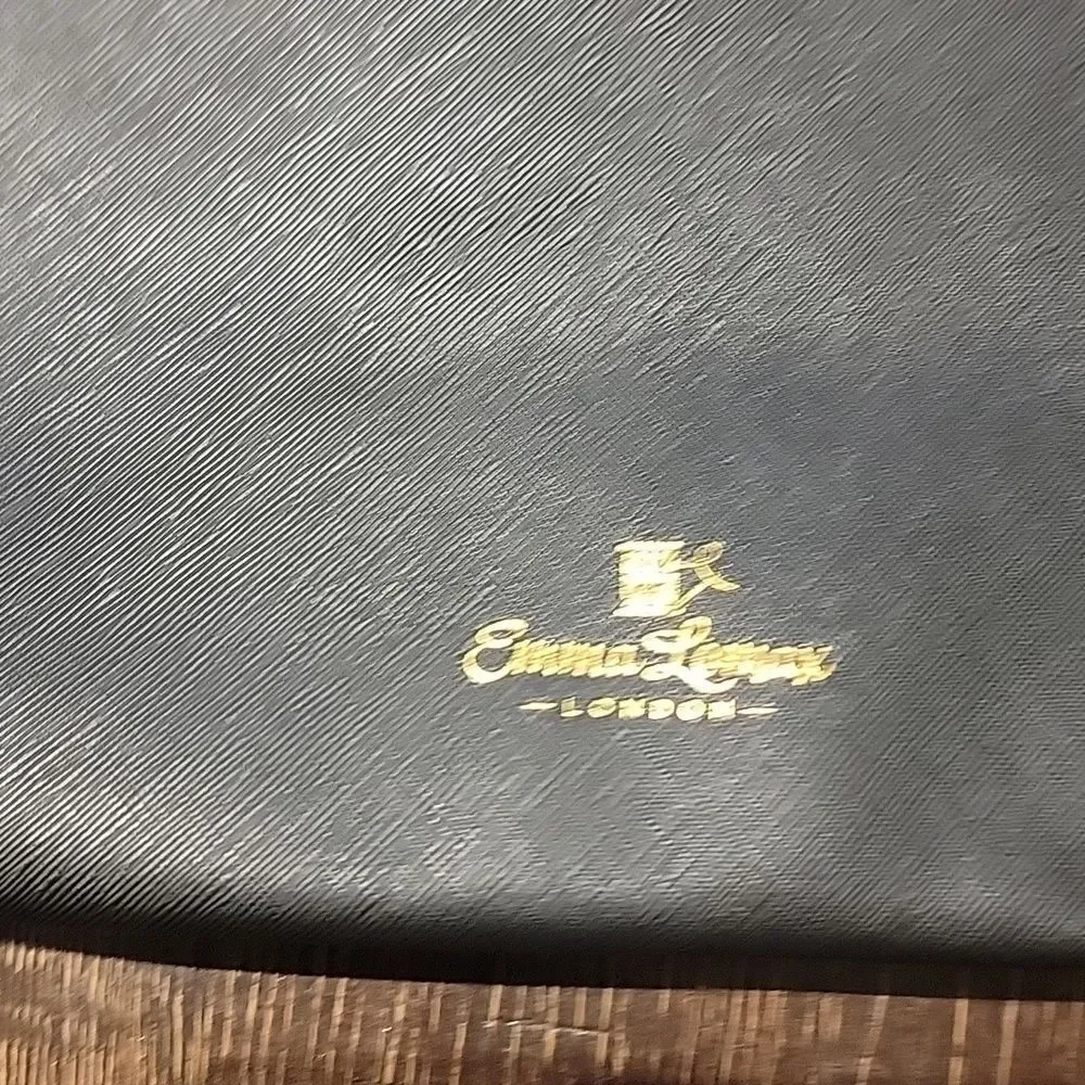 Emma Lomax Black and Gold Tassel Makeup Clutch Bag